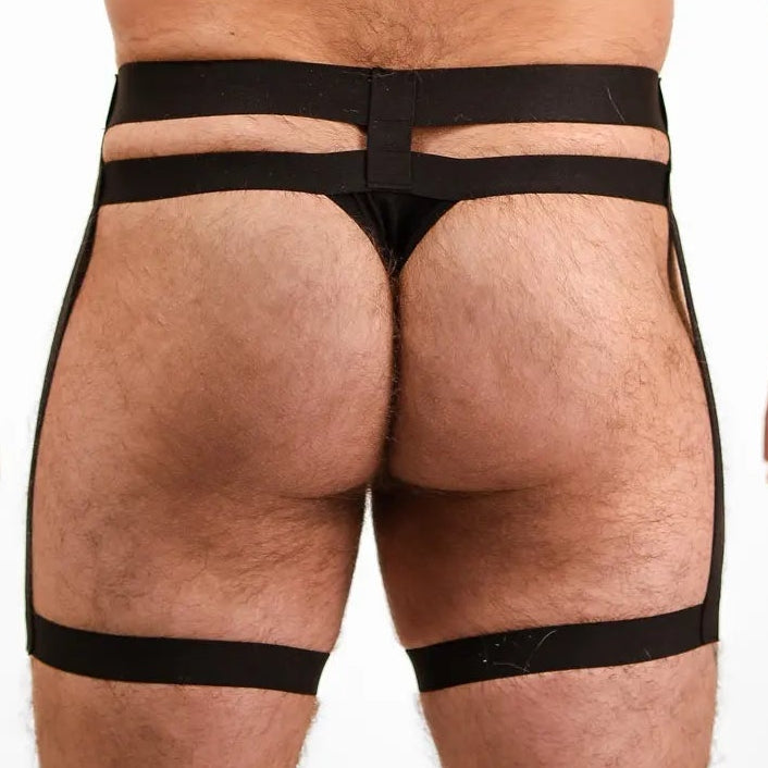 Man wearing black men's underwear on a white background