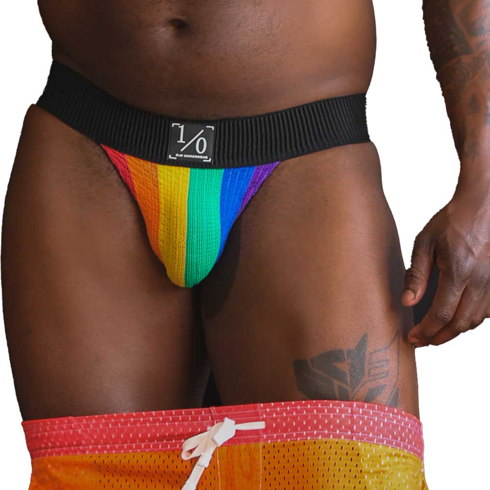 Person wearing a rainbow mesh thong with a visible brand logo on a white background. MENS LGBTQ+ PRIDE MESH JOCK STRAP | BOLD ENVY

Celebrate your pride in style with the Loud & Proud Jock! Soft, stretchy, and supportive, this jock strap is perfect for making a statement, day or night.